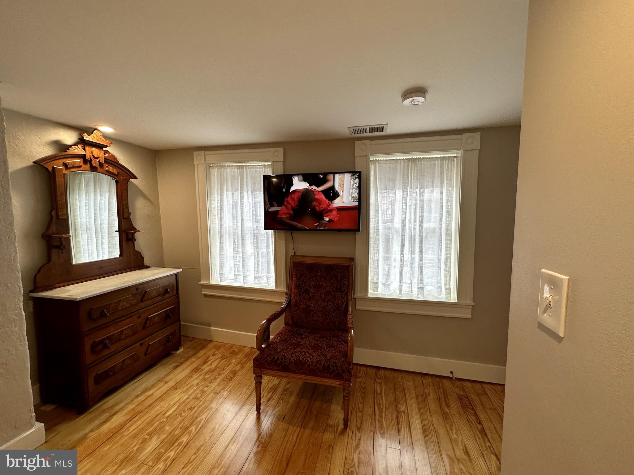 1627 Aliceanna Street Baltimore, MD 21231 - Photo 46 of 60 a living room with furniture and a wooden floor