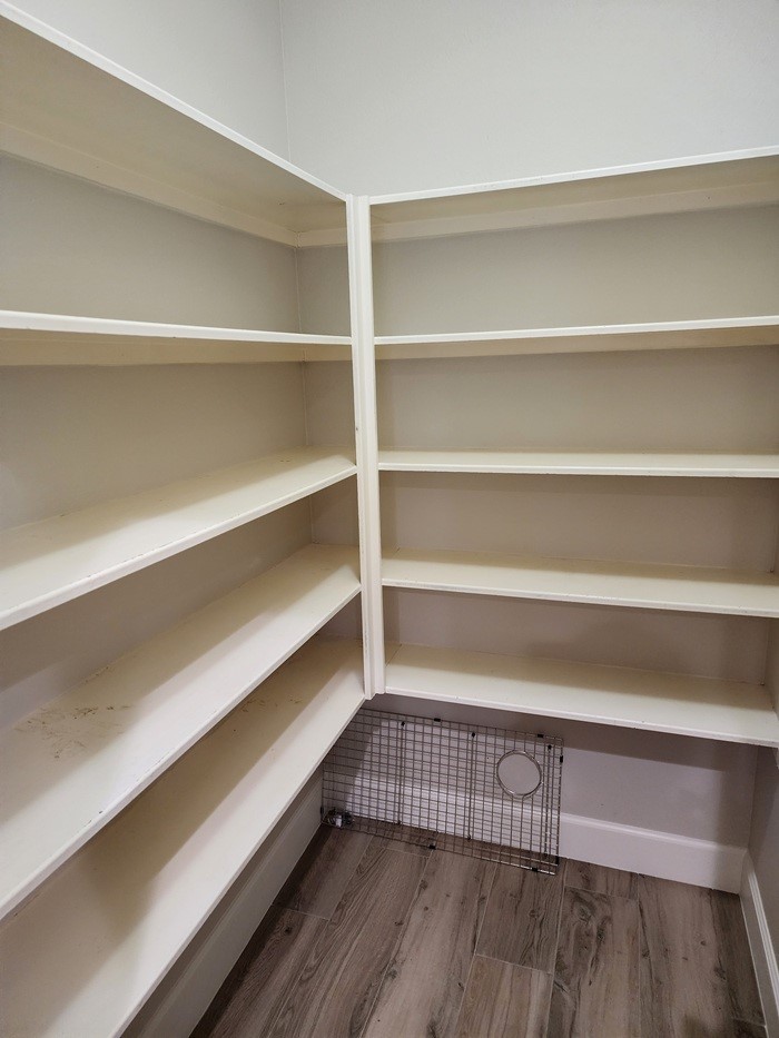 27131 Sunset Pines Drive Spring, TX 77373 - Photo 15 of 44 a view of walk in closet with empty racks