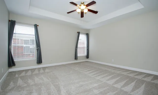 a view of a kitchen with wooden floor and a kitchen