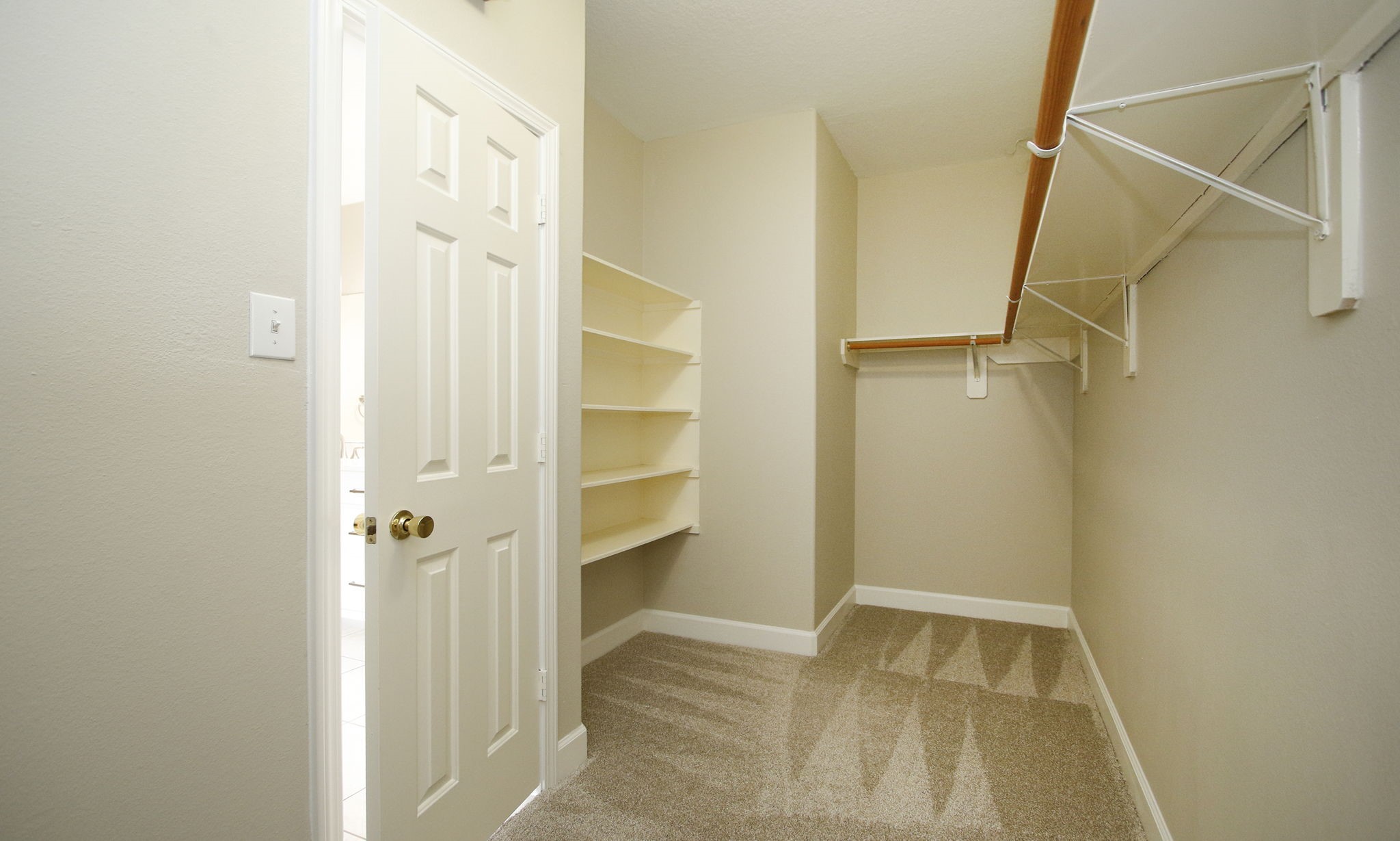 27131 Sunset Pines Drive Spring, TX 77373 - Photo 25 of 44 a view of walk in closet with empty racks