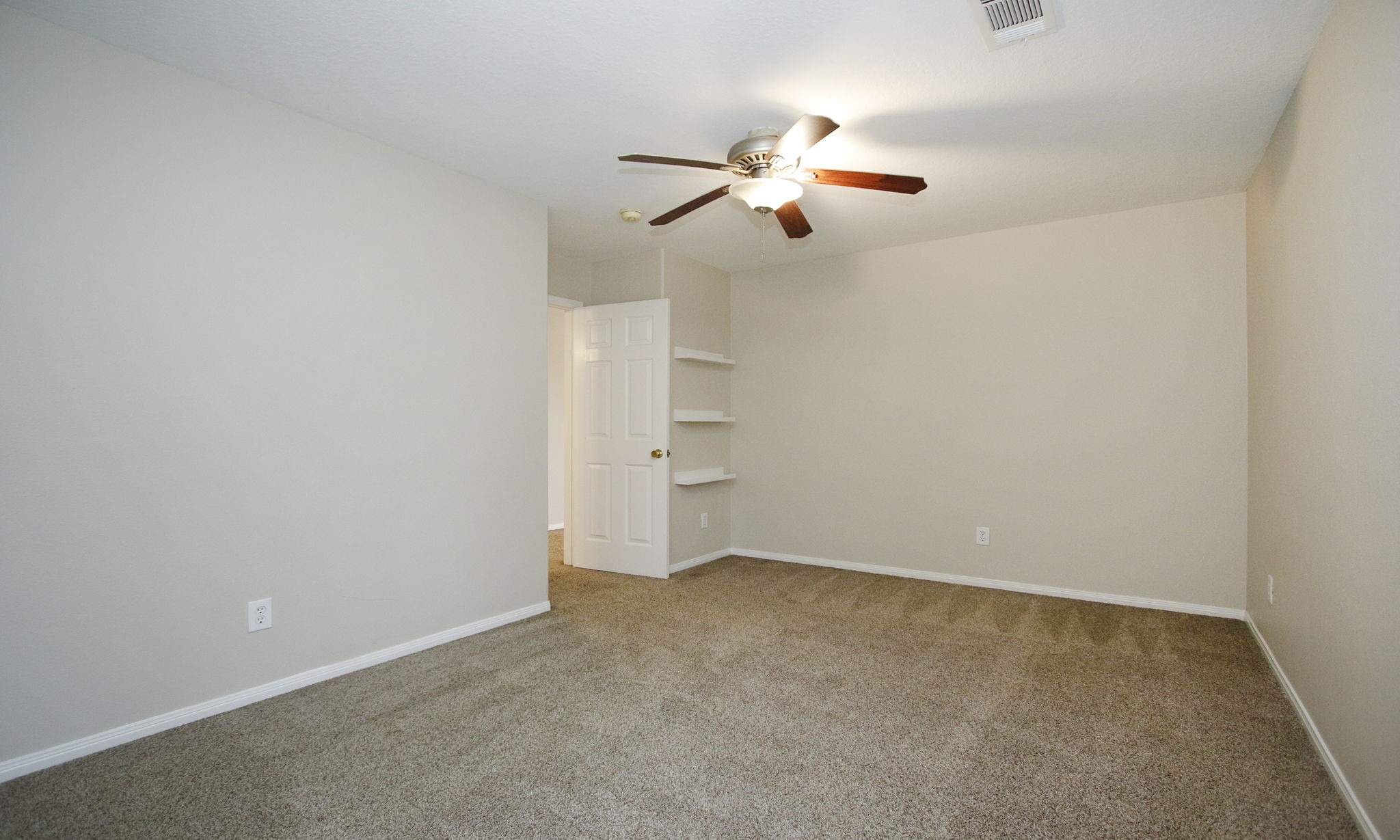 27131 Sunset Pines Drive Spring, TX 77373 - Photo 34 of 44 a view of an empty room with a chandelier fan