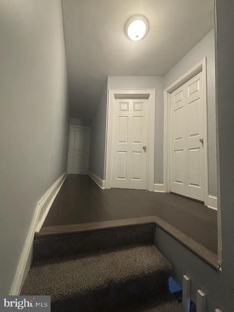 7014 Belclare Road Baltimore, MD 21222 - Photo 13 of 15 an empty room with wooden floor