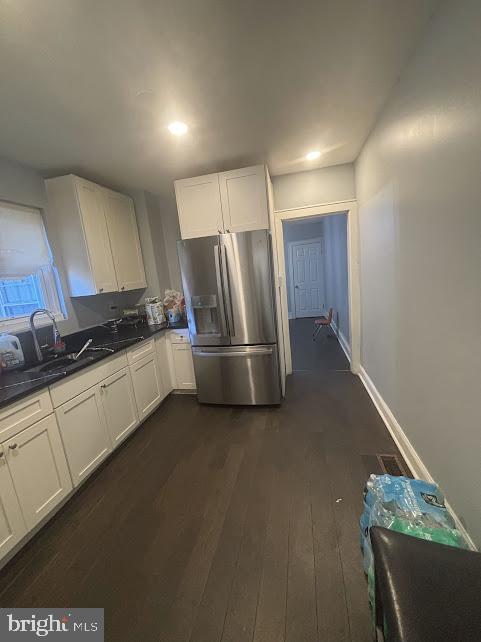 7014 Belclare Road Baltimore, MD 21222 - Photo 4 of 15 a kitchen with stainless steel appliances a refrigerator and a stove