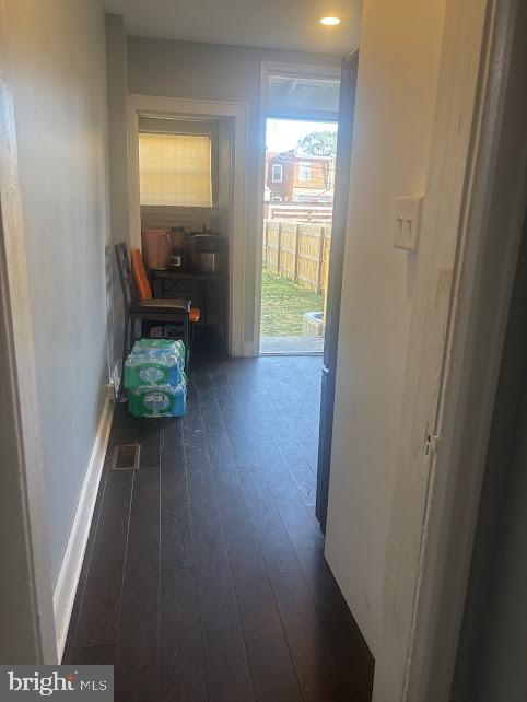 7014 Belclare Road Baltimore, MD 21222 - Photo 7 of 15 a view of livingroom with furniture and hardwood floor