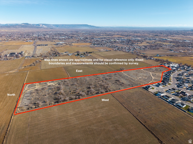 3073 West 500 South Vernal, UT 84078 - Photo 7 of 8 Aerial overview of property's location featuring property boundaries highlighted and a mountain backdrop
