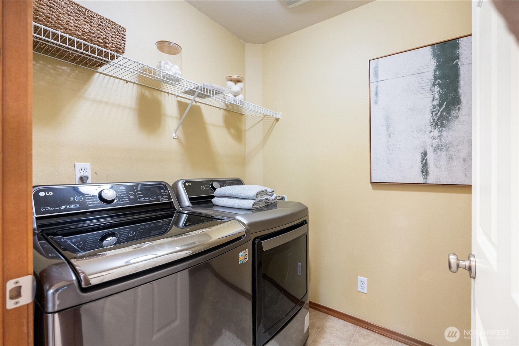 18722 3rd Avenue West Bothell, WA 98012 - Photo 25 of 35 a view of storage and utility room with racks on the wall