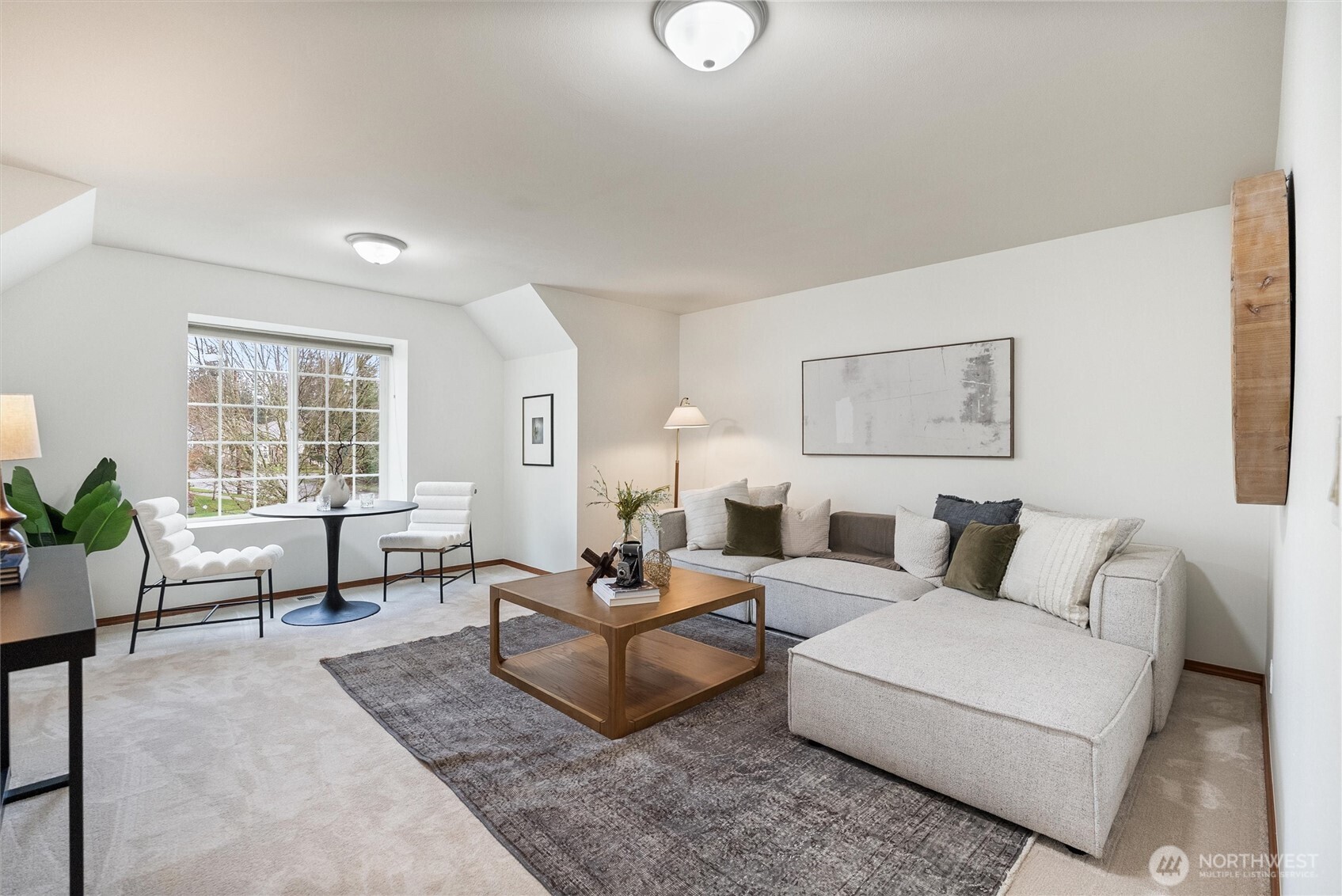 18722 3rd Avenue West Bothell, WA 98012 - Photo 26 of 35 a living room with furniture and a large window