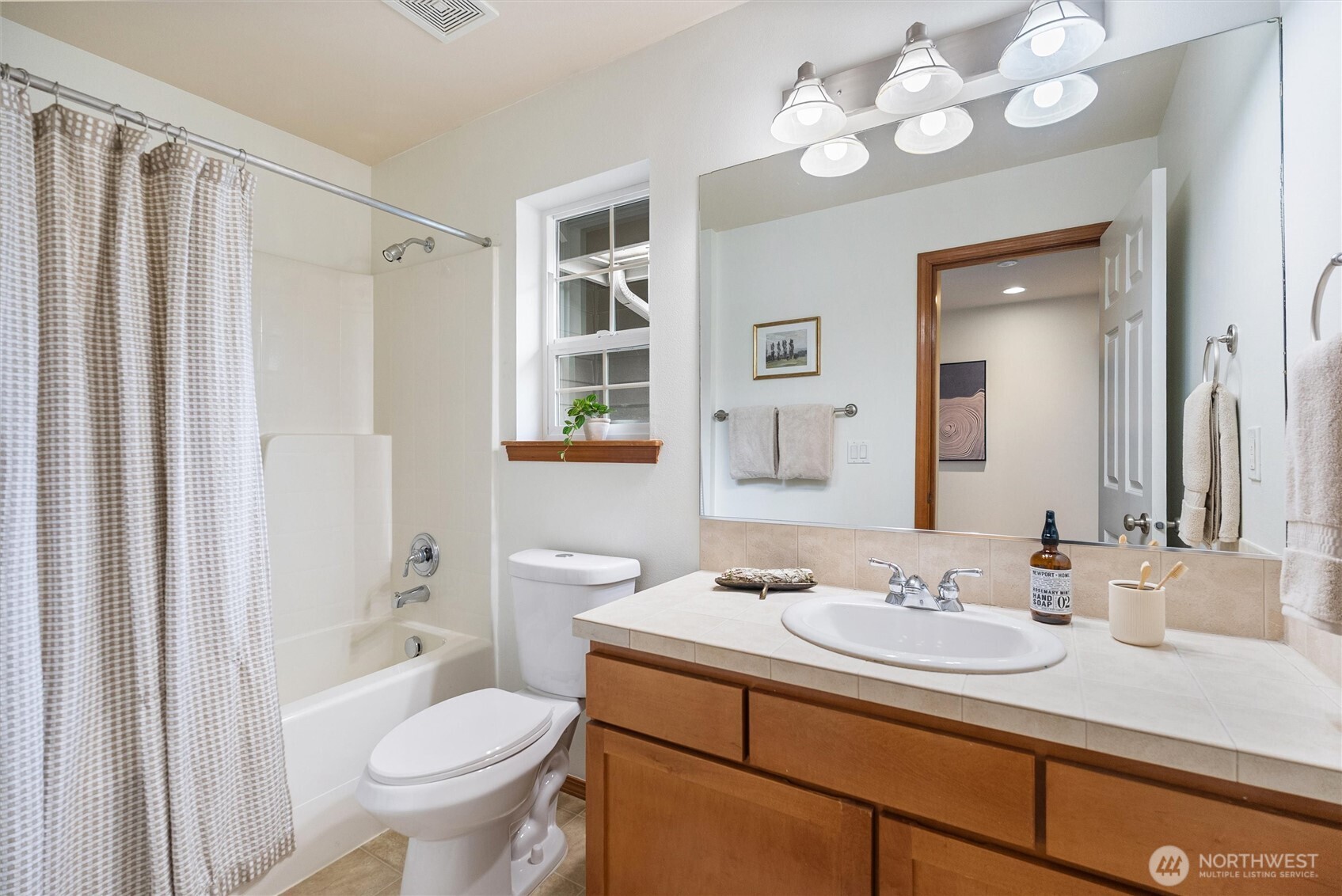 18722 3rd Avenue West Bothell, WA 98012 - Photo 28 of 35 a bathroom with a sink toilet vanity and shower
