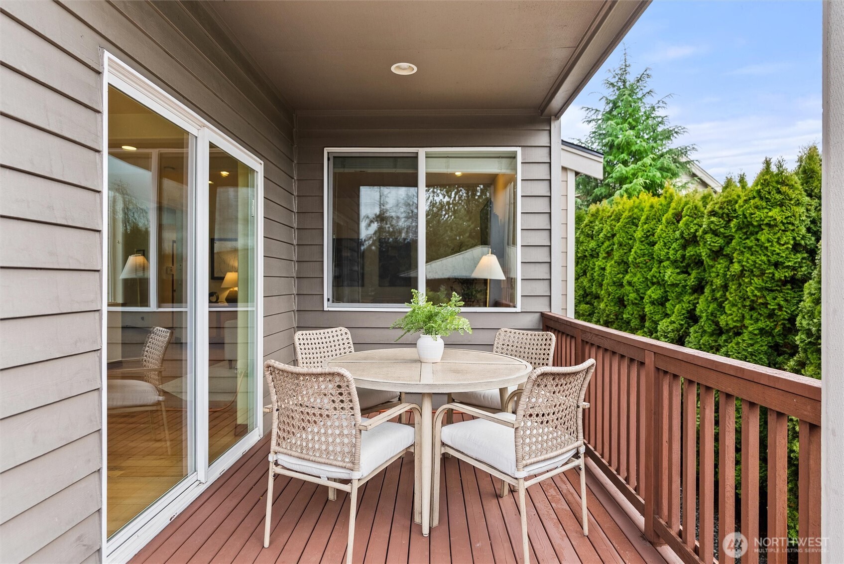 18722 3rd Avenue West Bothell, WA 98012 - Photo 29 of 35 a view of a two chairs and table in the balcony