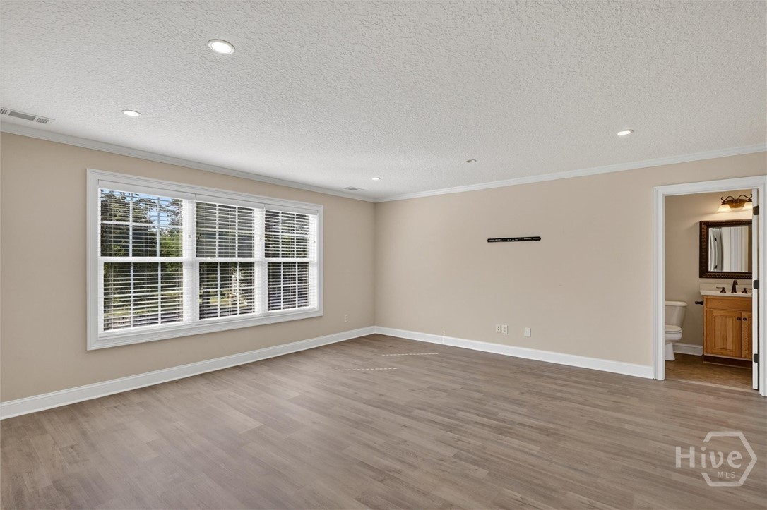 197 Cubbedge Drive Rincon, GA 31326 - Photo 24 of 43 Guest Suite #1 with new luxury vinyl plank flooring