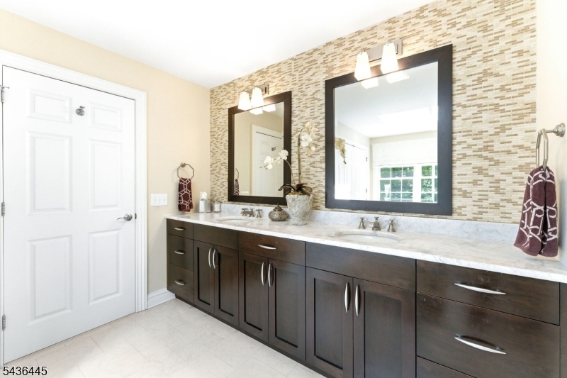 4 Windemere Way Sparta, NJ 07871 - Photo 26 of 50 a bathroom with a double vanity sink mirror and
