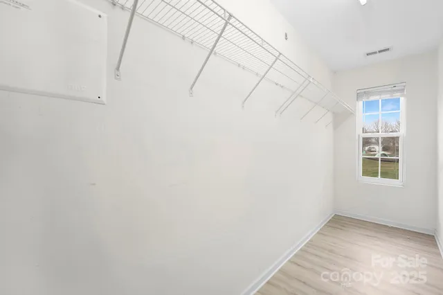 a view of a room with racks on the wall