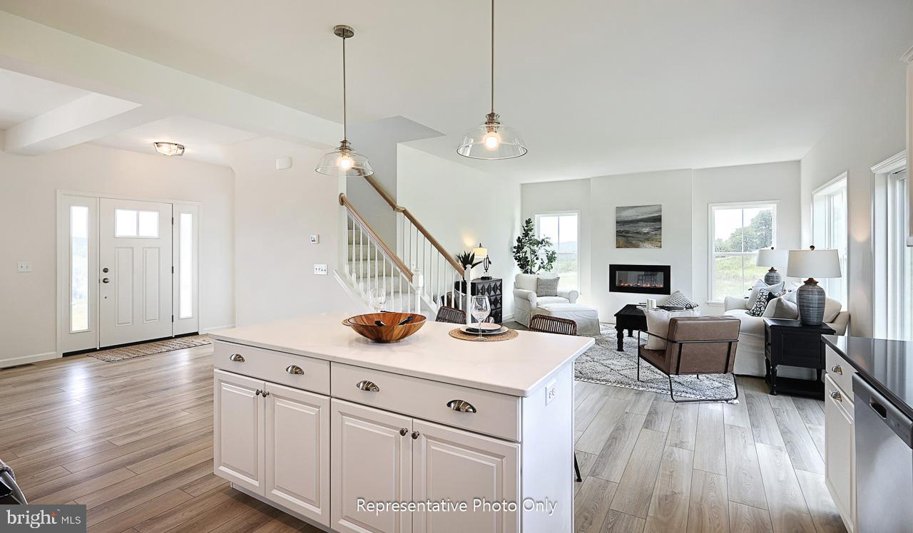 109 Copper Ridge Drive Newmanstown, PA 17073 - Photo 11 of 27 a view of a kitchen and living room with wooden floor