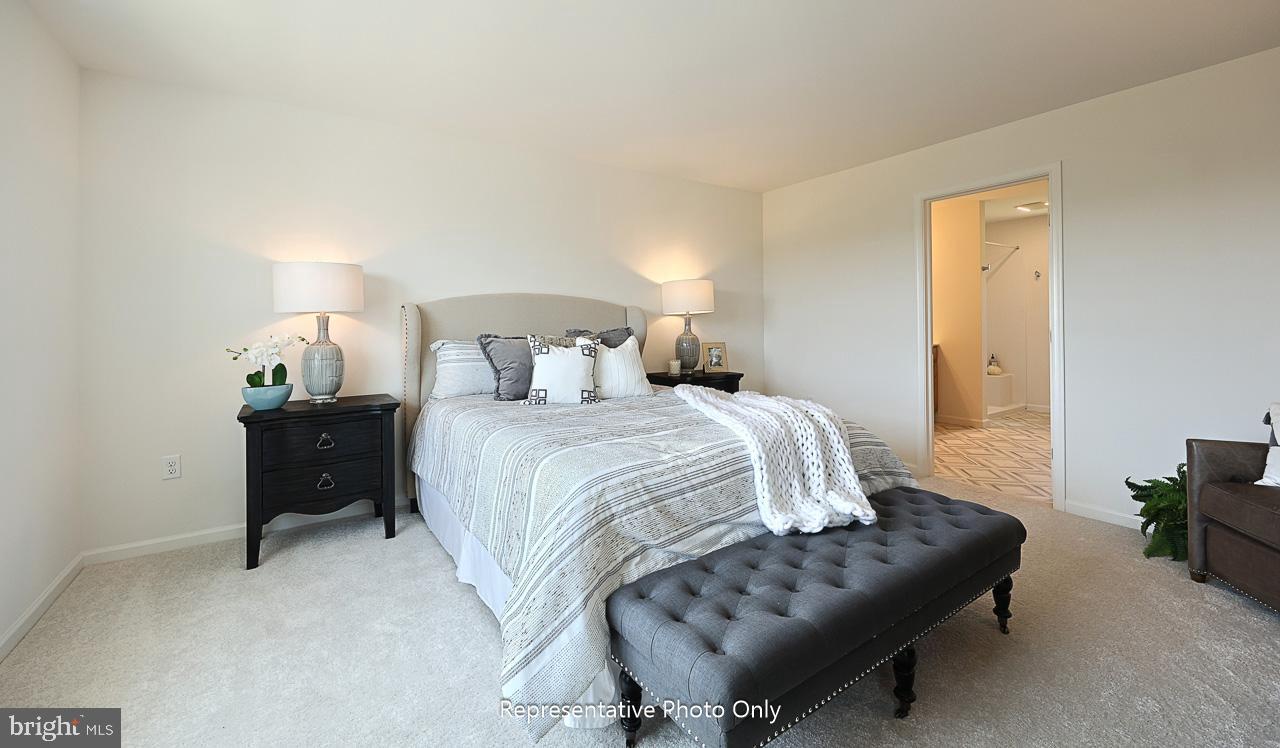 109 Copper Ridge Drive Newmanstown, PA 17073 - Photo 22 of 27 a bedroom with a bed and a couch