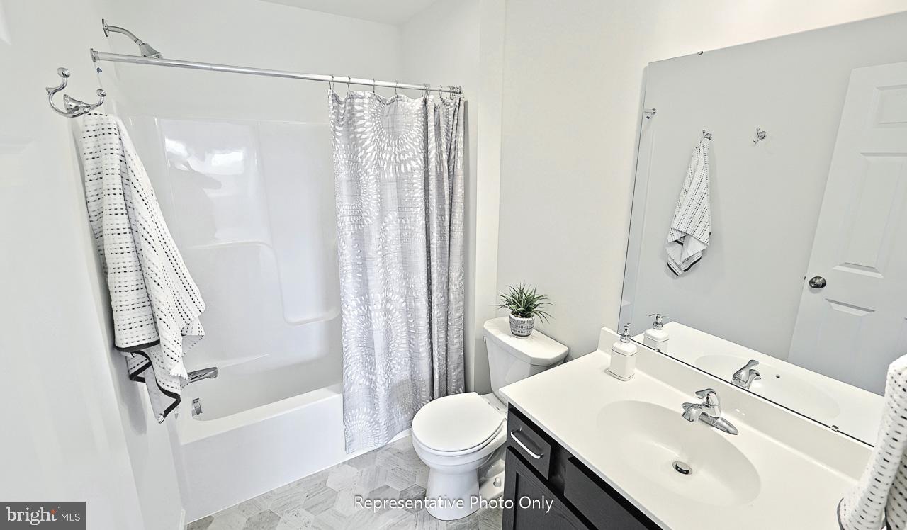 109 Copper Ridge Drive Newmanstown, PA 17073 - Photo 24 of 27 a bathroom with a sink toilet and shower