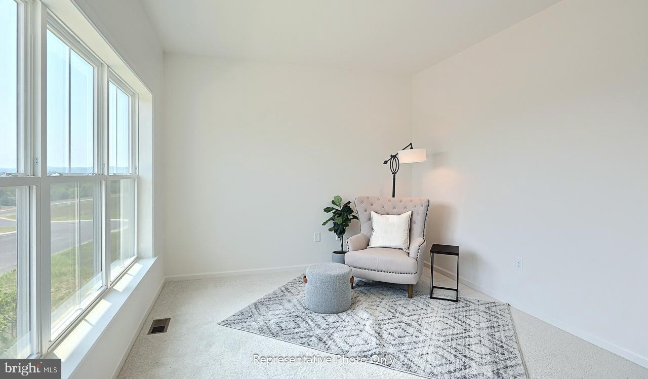 109 Copper Ridge Drive Newmanstown, PA 17073 - Photo 6 of 27 a living room with furniture and a rug