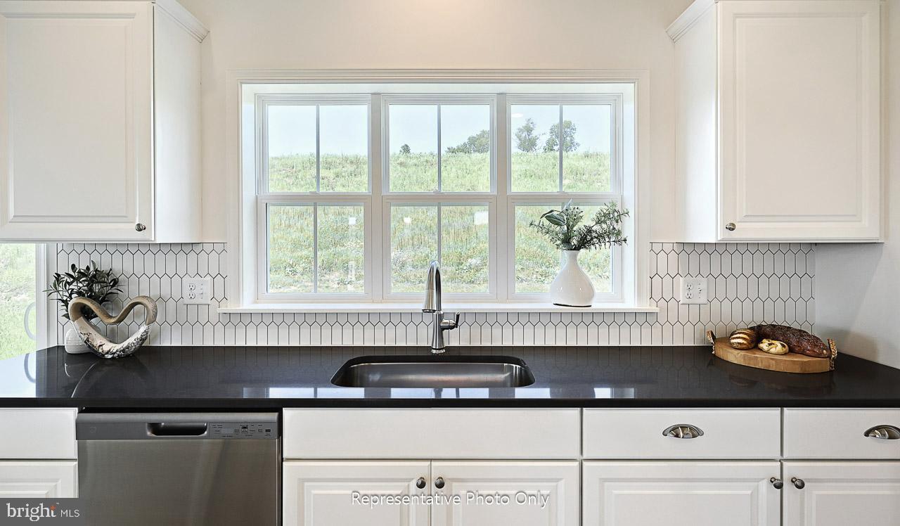 109 Copper Ridge Drive Newmanstown, PA 17073 - Photo 7 of 27 a kitchen with a sink and a window