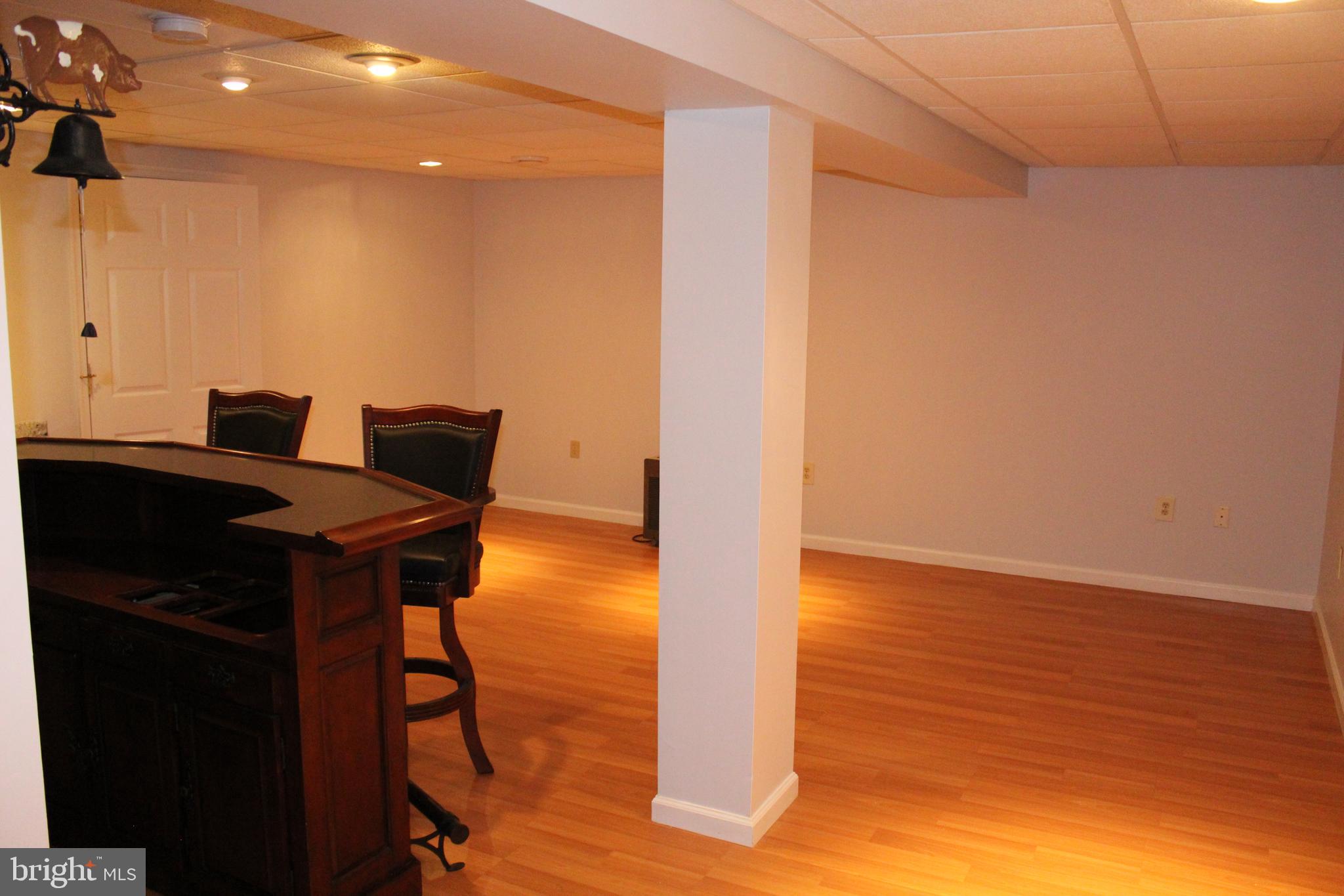 15 Ryan Court Telford, PA 18969 - Photo 18 of 26 a view of a workspace with furniture and wooden floor
