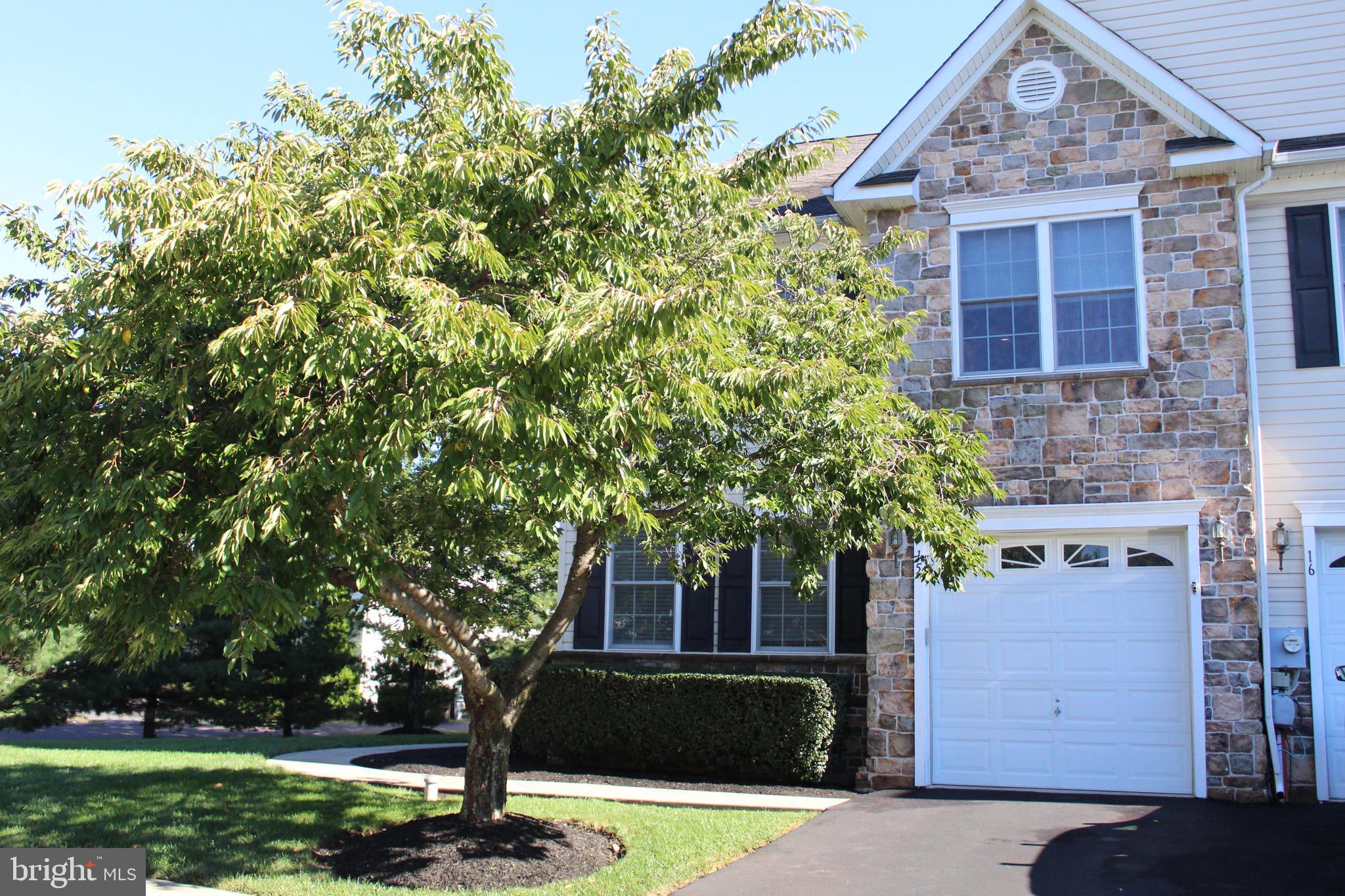 15 Ryan Court Telford, PA 18969 - Photo 2 of 26 front view of a house with a tree