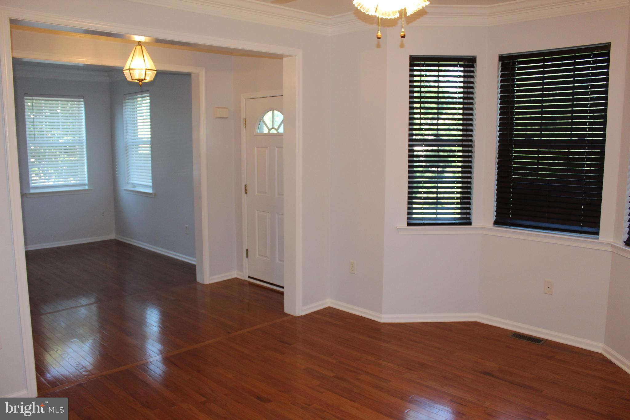 15 Ryan Court Telford, PA 18969 - Photo 4 of 26 a view of empty room with wooden floor and fan