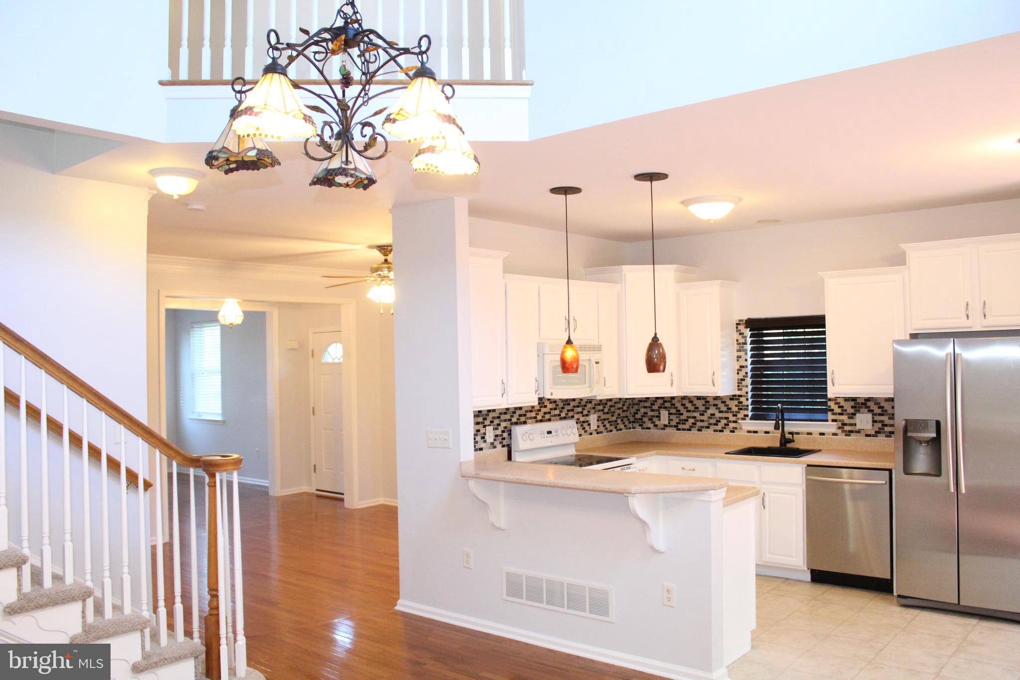 15 Ryan Court Telford, PA 18969 - Photo 8 of 26 a view of a kitchen with a sink and refrigerator