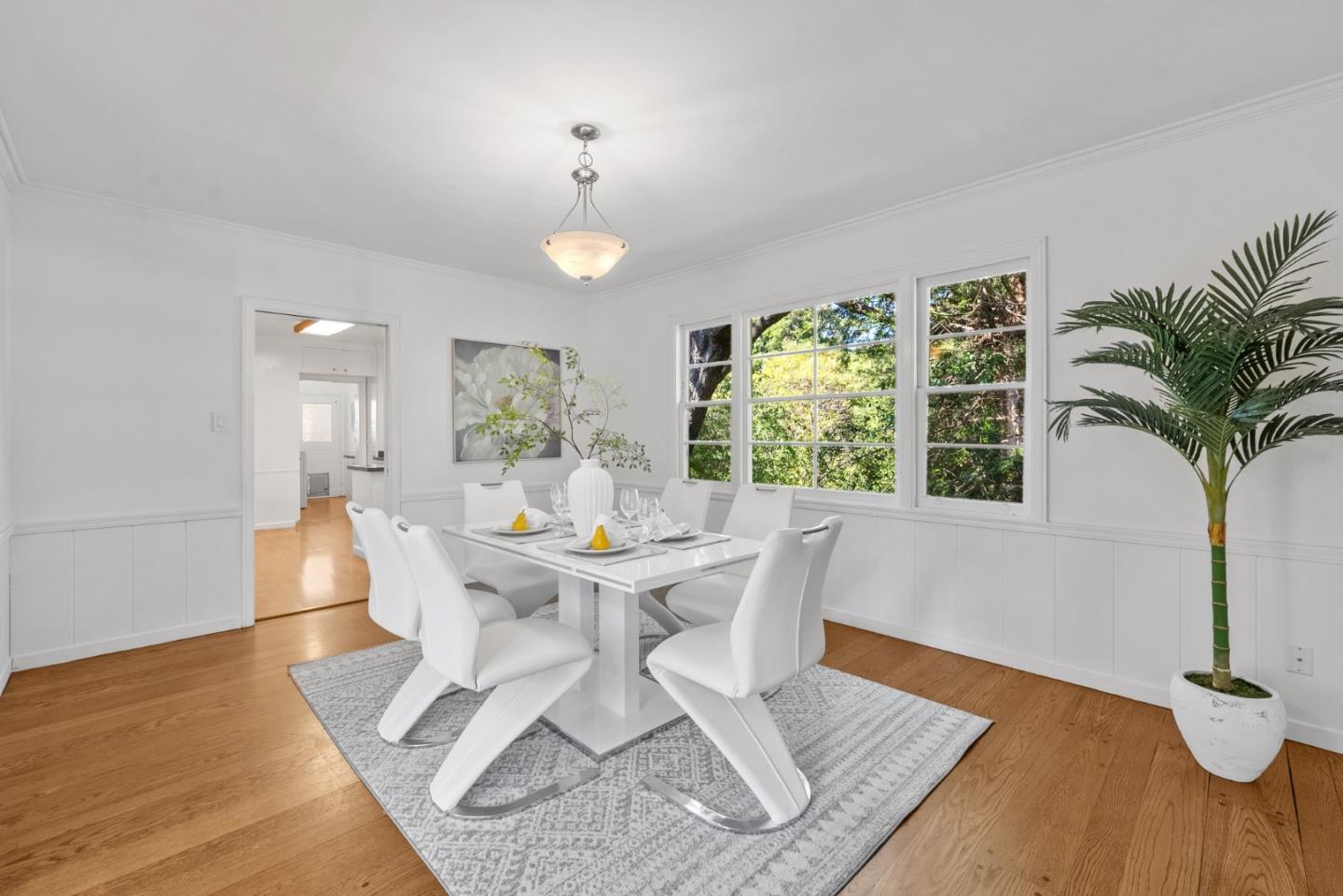 410 Fulton Road San Mateo, CA 94402 - Photo 18 of 49 a view of a dining room with furniture window and wooden floor