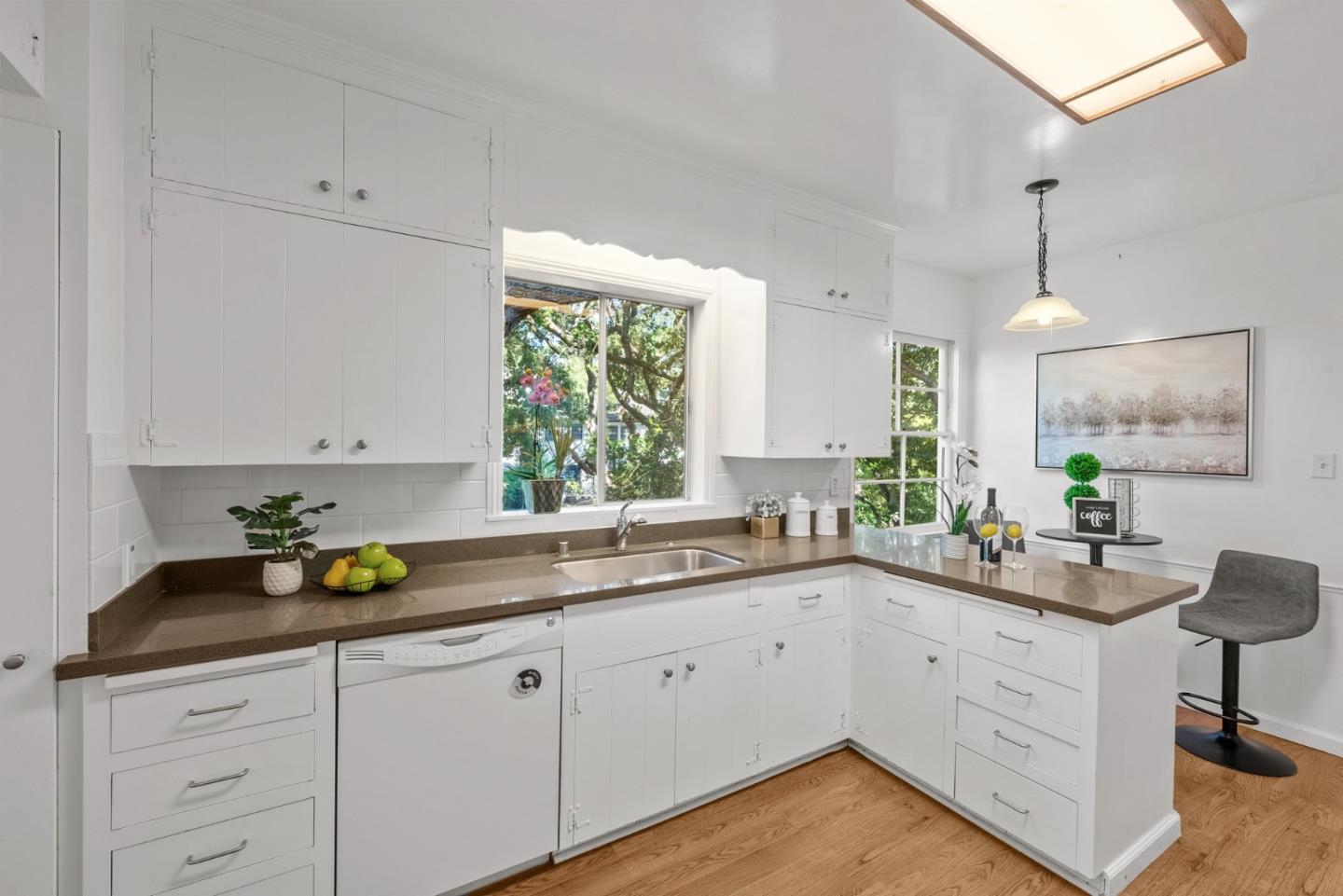 410 Fulton Road San Mateo, CA 94402 - Photo 22 of 49 a kitchen with a sink cabinets and window