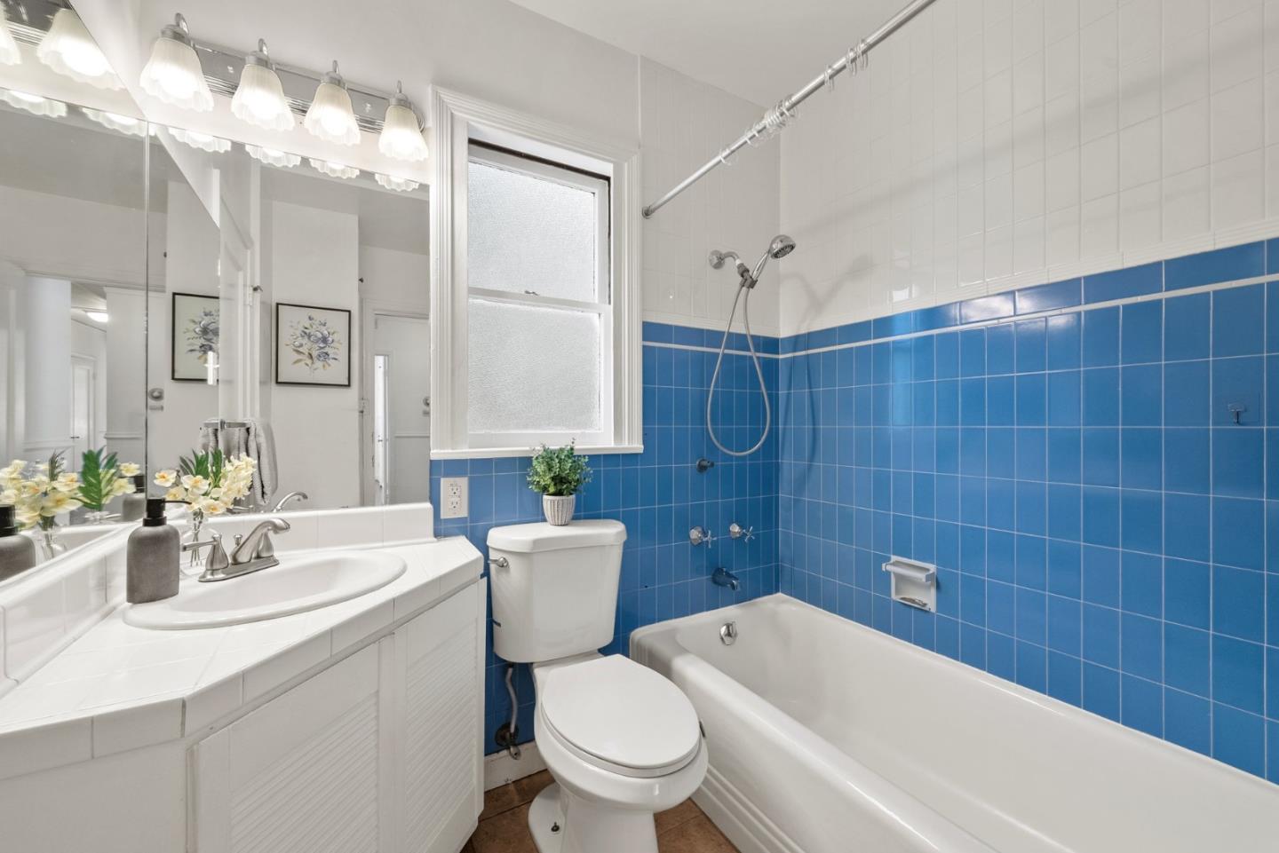 410 Fulton Road San Mateo, CA 94402 - Photo 26 of 49 a bathroom with a sink a toilet and bathtub