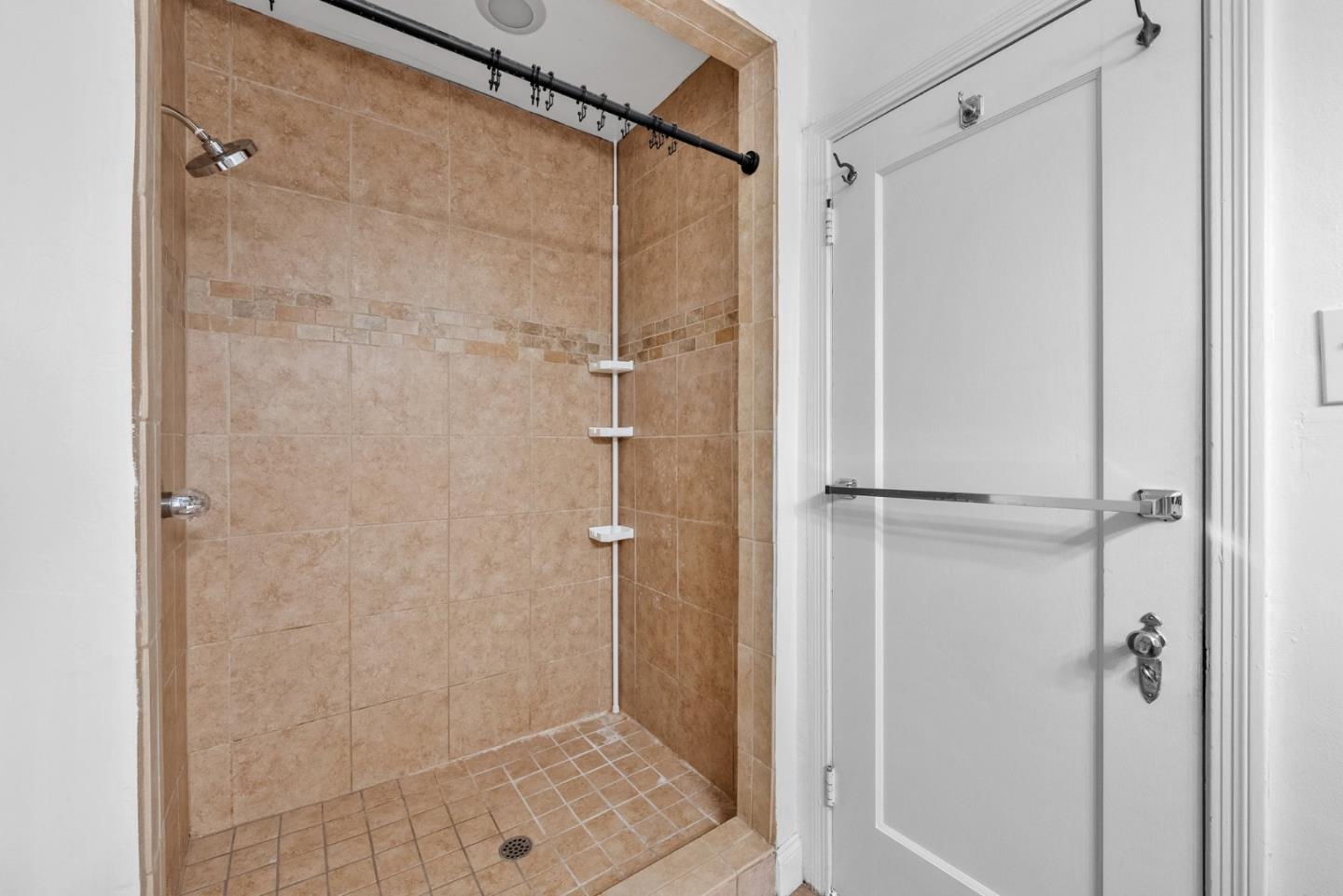 410 Fulton Road San Mateo, CA 94402 - Photo 32 of 49 a bathroom with a glass door shower