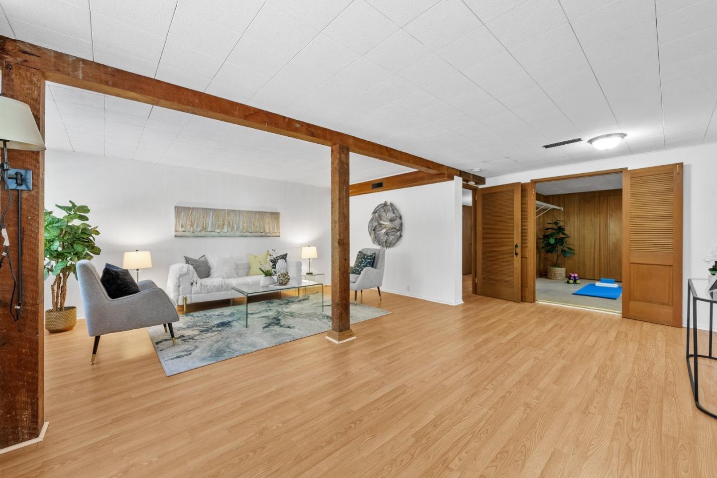 410 Fulton Road San Mateo, CA 94402 - Photo 37 of 49 a living room with furniture and a wooden floor