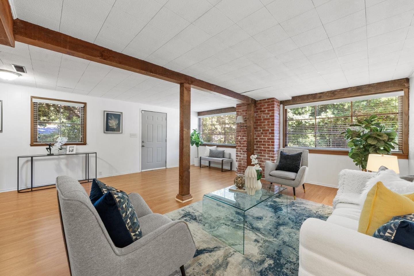 410 Fulton Road San Mateo, CA 94402 - Photo 38 of 49 a living room with furniture large window and wooden floor