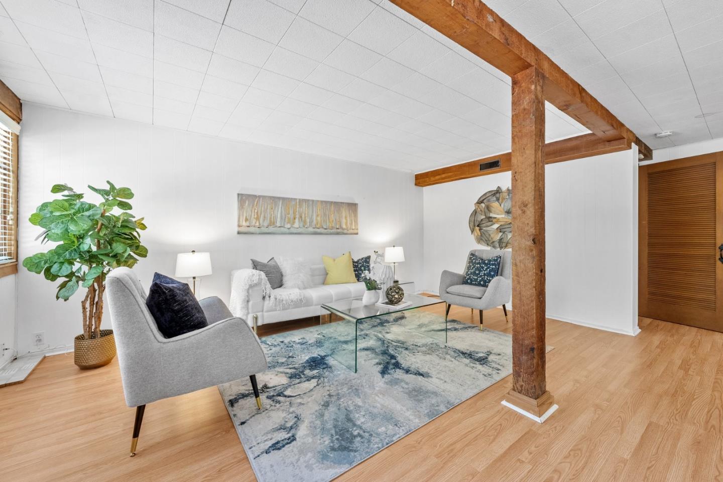 410 Fulton Road San Mateo, CA 94402 - Photo 39 of 49 a living room with furniture and a potted plant