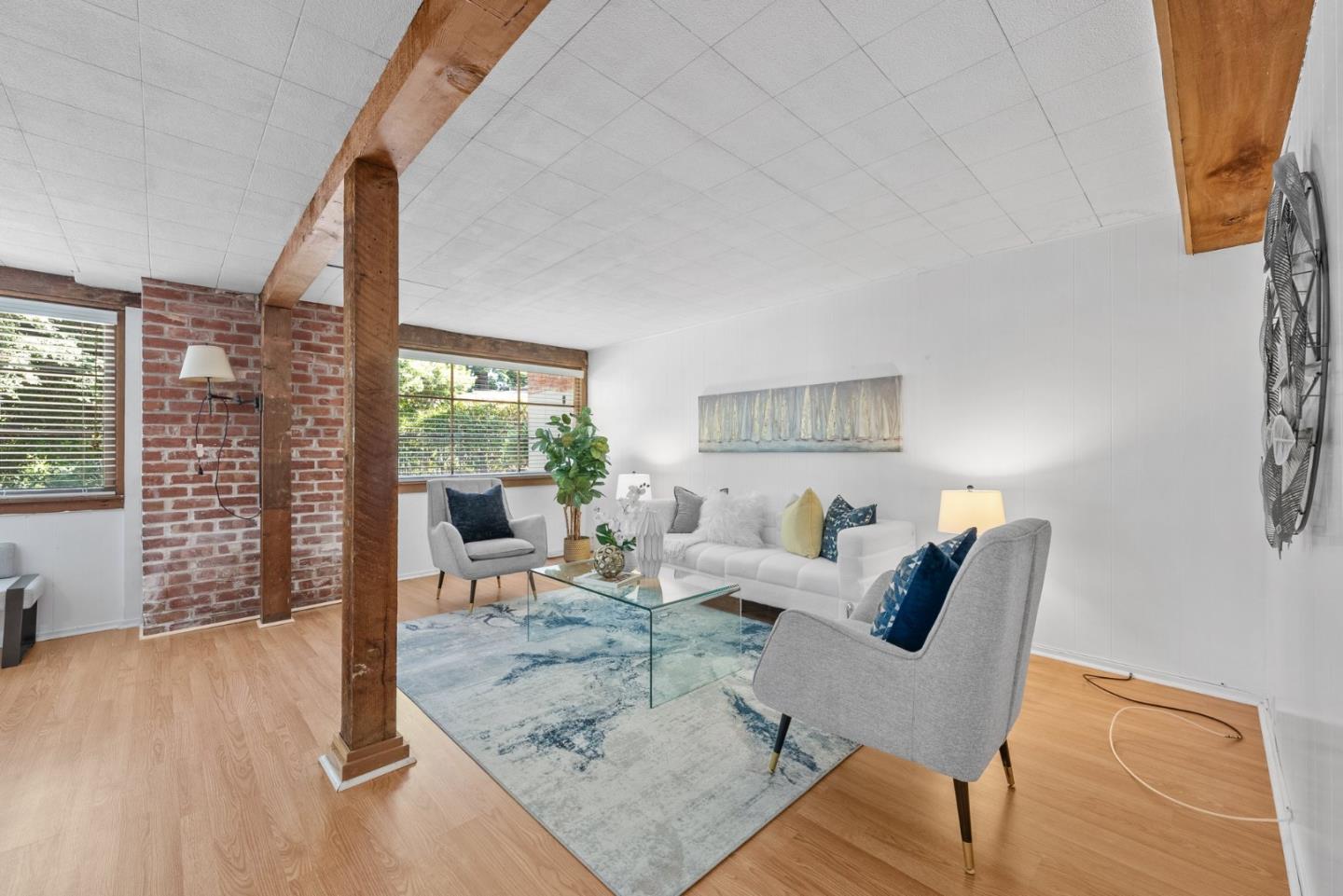 410 Fulton Road San Mateo, CA 94402 - Photo 40 of 49 a living room with furniture and a wooden floor