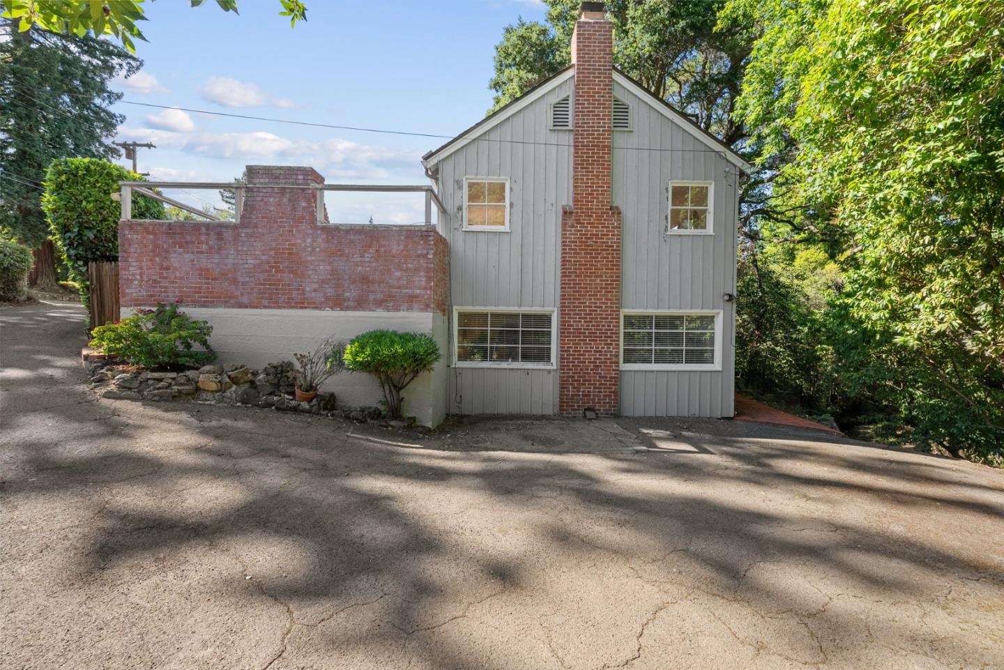 410 Fulton Road San Mateo, CA 94402 - Photo 41 of 49 a view of a house with a yard