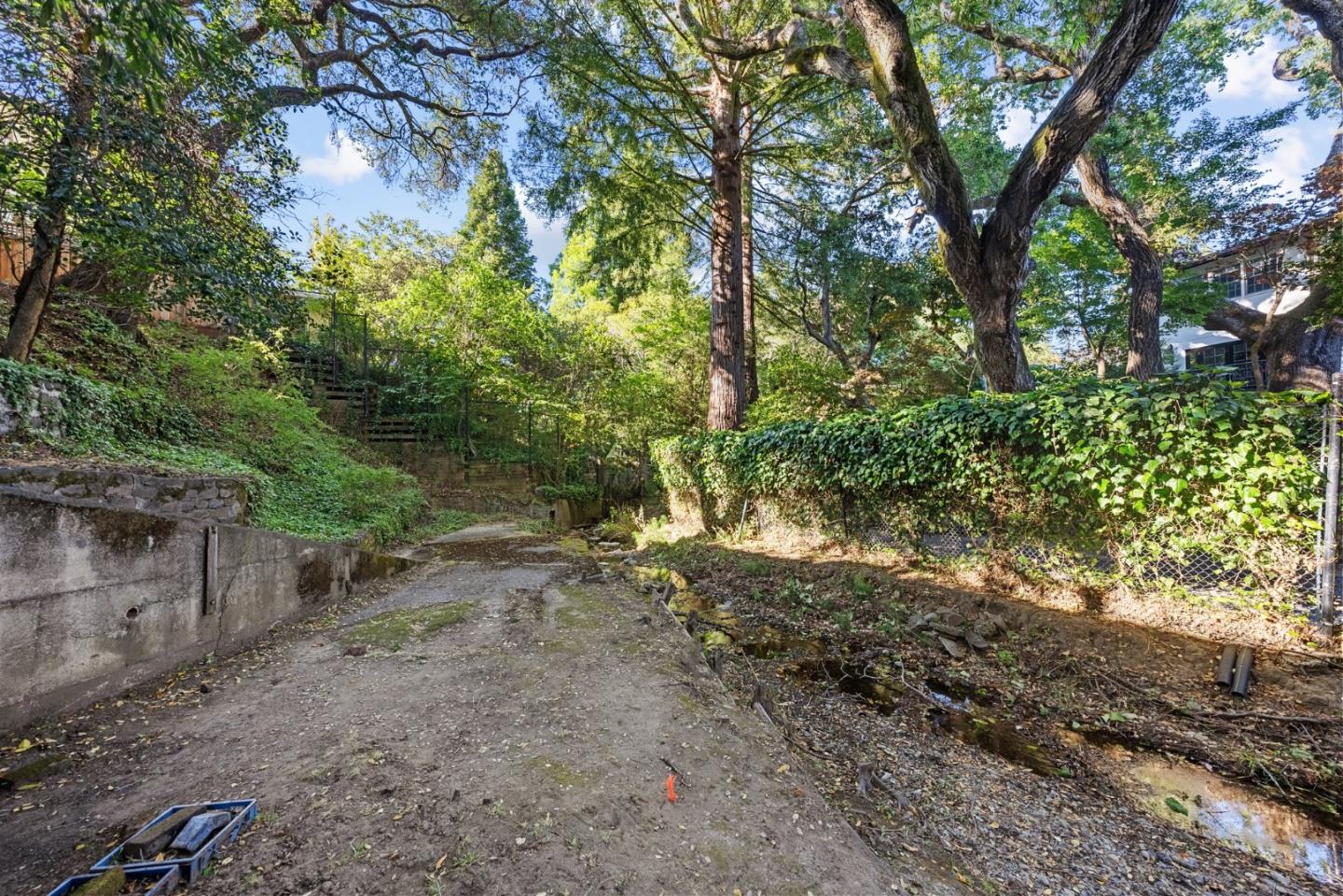 410 Fulton Road San Mateo, CA 94402 - Photo 48 of 49 a backyard of a house with lots of green space
