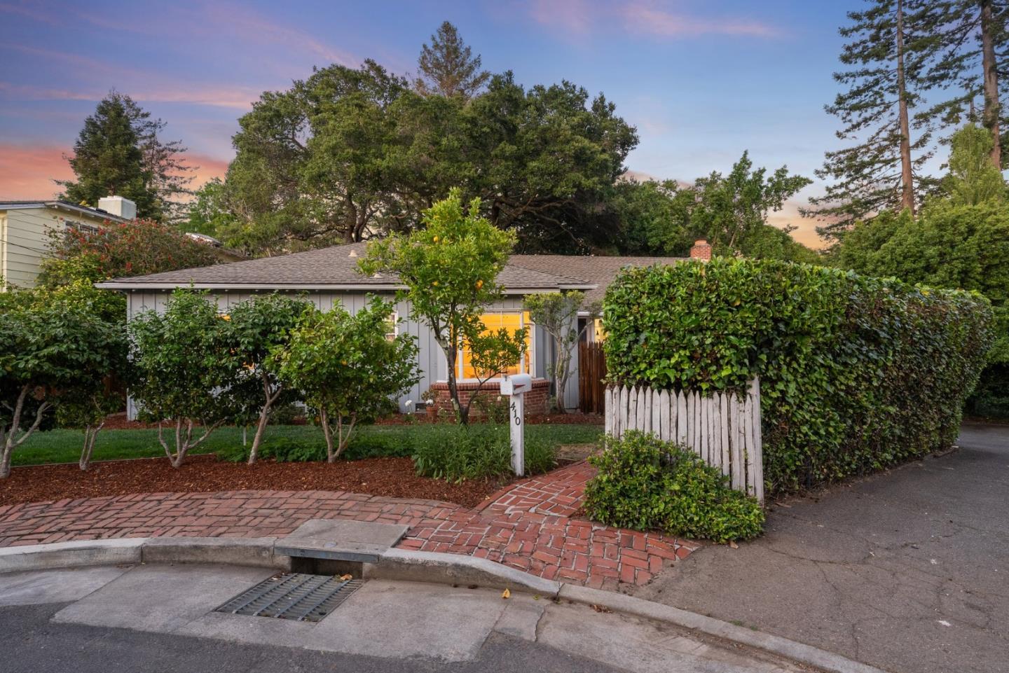 410 Fulton Road San Mateo, CA 94402 - Photo 5 of 49 a front view of a house with garden