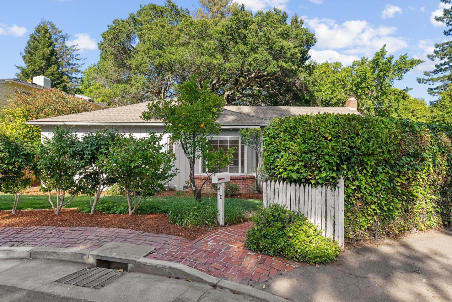 410 Fulton Road San Mateo, CA 94402 - Photo 6 of 49 a front view of a house with a yard