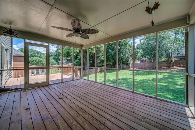 a view of outdoor space with wooden floor