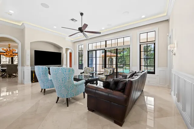 a view of hallway with stairs and wooden floor