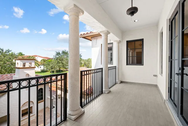a bathroom with a granite countertop sink toilet a mirror and shower