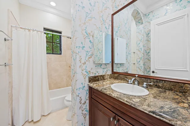 a bath tub sitting next to a window