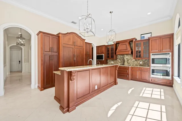 a view of a kitchen with washer and dryer