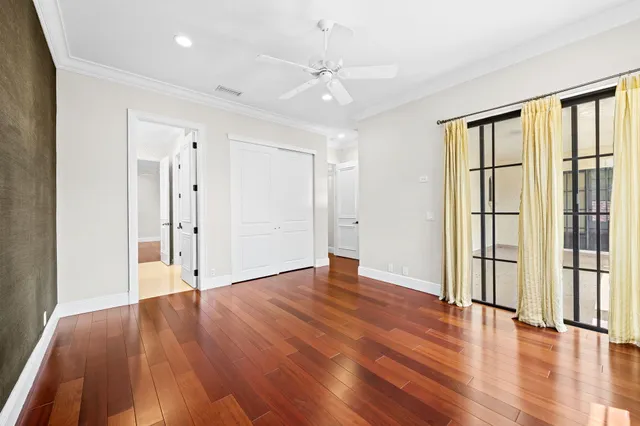 an aerial view of a residential houses with outdoor space and swimming pool