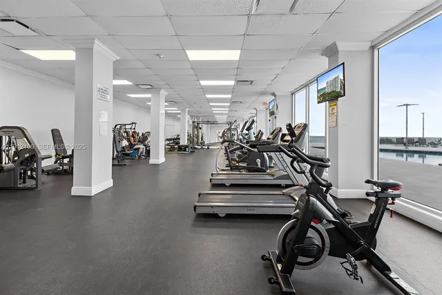 a view of a room with kitchen and living room