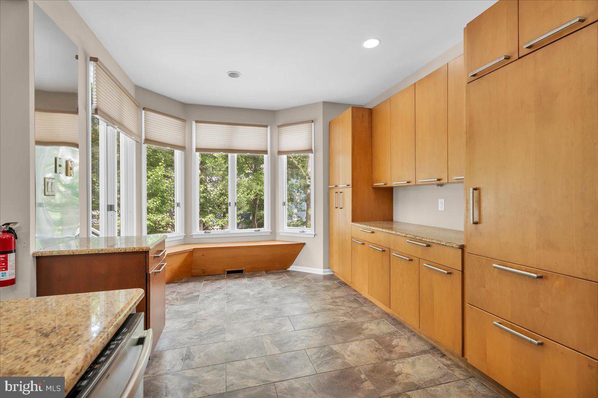 5 Promenade Place Voorhees, NJ 08043 - Photo 12 of 24 a large white kitchen with a large window