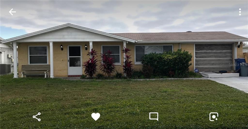 3724 Carioca Road Holiday, FL 34691 - Photo 1 of 1 a front view of house with yard