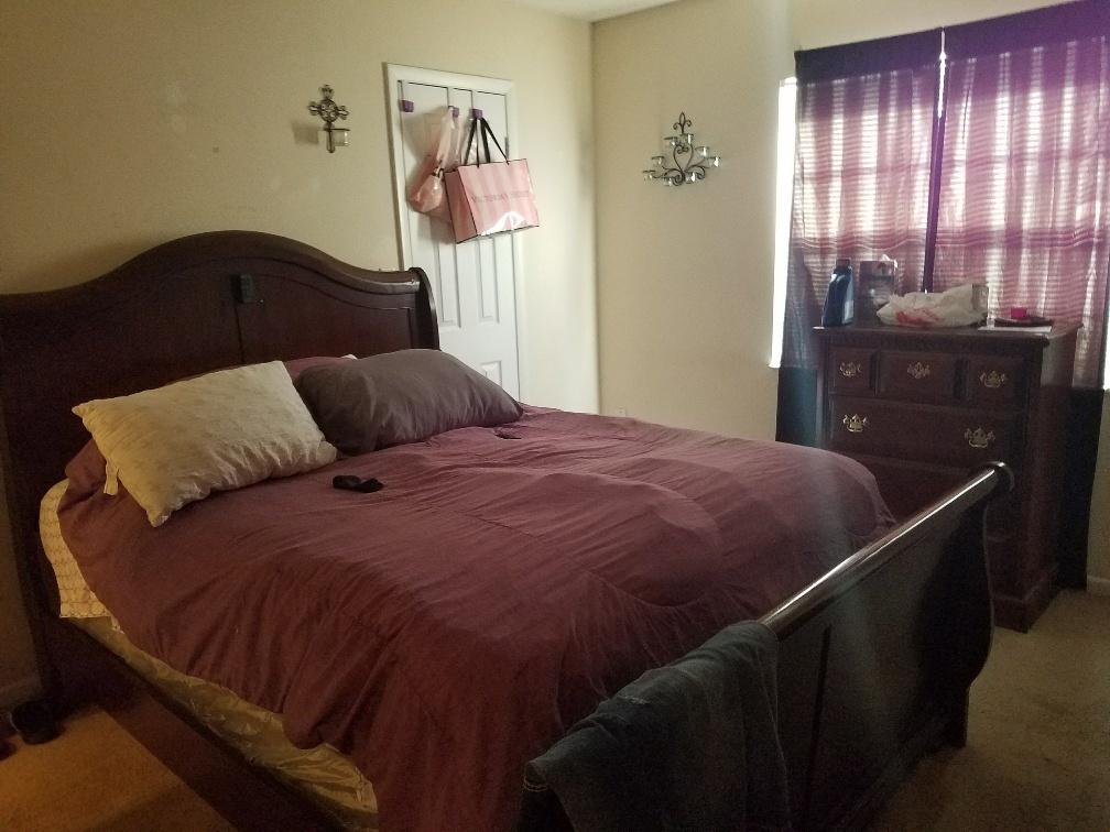2007 Oleander Boulevard, Unit B Fort Pierce, FL 34950 - Photo 15 of 17 a bedroom with a bed and window