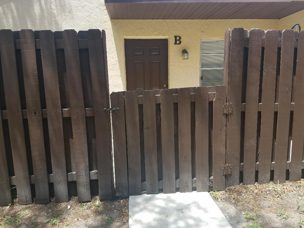 2007 Oleander Boulevard, Unit B Fort Pierce, FL 34950 - Photo 5 of 17 a view of a wooden fence