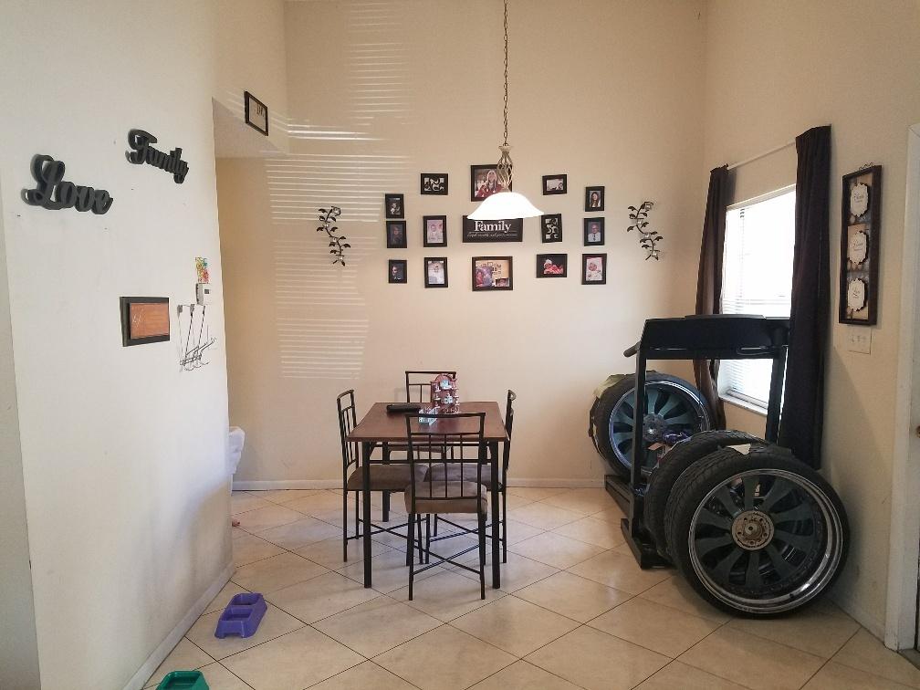 2007 Oleander Boulevard, Unit B Fort Pierce, FL 34950 - Photo 10 of 17 a view of a livingroom with furniture and windows