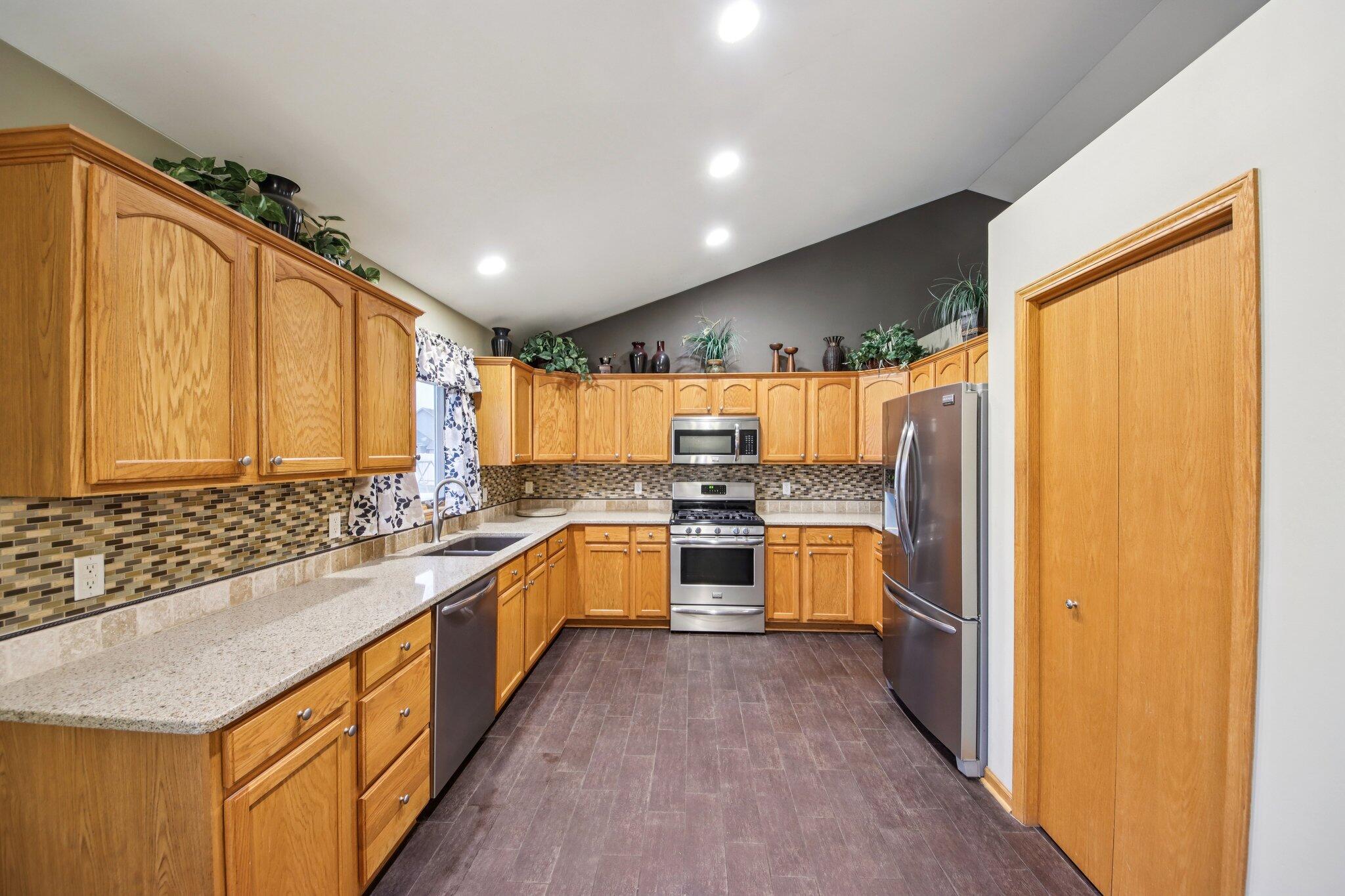 9396 Calumet Street Dyer, IN 46311 - Photo 11 of 43 a large kitchen with a large window